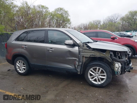 2014 Kia Sorento LX with VIN 5XYKT3A67EG477367, listed as a IAAI auction lot 41911249 with 172,320 mi miles and . Bid and sale history available at DreamBid. Image 14.
