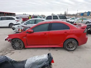 2016 Mitsubishi Lancer GT with VIN JA32U8FW1GU012988, listed as a IAAI auction lot 41498905 with 94,727 mi miles. Bid and sale history available at carsss.com. Image 13.