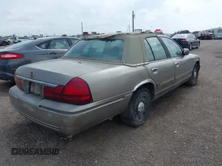 2003 Mercury Grand Marquis GS Convenience with VIN 2MEFM74W93X640458, listed as a IAAI auction lot 42137834 with 159,455 mi miles and . Bid and sale history available at DreamBid. Image 4.