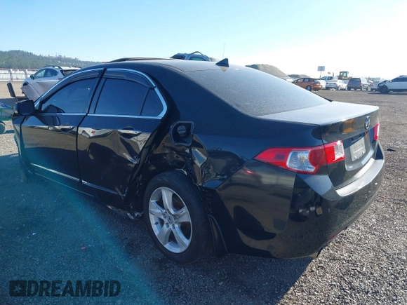 2009 Acura TSX with VIN JH4CU26659C021235, listed as a IAAI auction lot 42014591 with 201,036 mi miles. Bid and sale history available at carsss.com. Image 3.