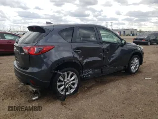 2015 Mazda CX-5 Grand Touring with VIN JM3KE4DY2F0526535, listed as a Copart auction lot 53046855 with 90,288 mi miles and Salvage Title. Bid and sale history available at DreamBid. Image 3.
