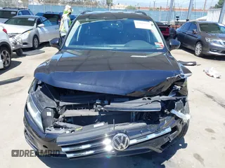 2018 Volkswagen Tiguan SEL z VIN 3VV3B7AX3JM210300, wystawiony jako IAAI lot #42189355 z przebiegiem 83 802 mil mil oraz . Historia ofert i sprzedaży dostępna na DreamBid. Obrazek 12.