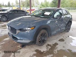 2023 Mazda CX-30 S Carbon Edition with VIN 3MVDMBCM1PM558865, listed as a IAAI auction lot 42298416 with 19,276 mi miles and . Bid and sale history available at DreamBid. Image 2.