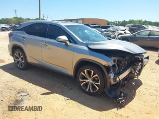 2017 Lexus RX 350 z VIN 2T2ZZMCA0HC043355, wystawiony jako IAAI lot #42133809 z przebiegiem 94 787 mil mil oraz . Historia ofert i sprzedaży dostępna na DreamBid. Obrazek 1.