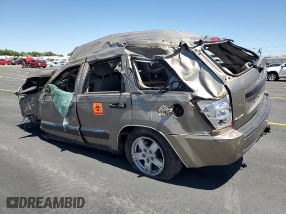 2005 Jeep Grand Cherokee Laredo z VIN 1J4HR48N65C517657, wystawiony jako Copart lot #58774685 z przebiegiem Nie podano mil oraz Szkoda całkowita • Salvage title. Historia ofert i sprzedaży dostępna na DreamBid. Obrazek 2.