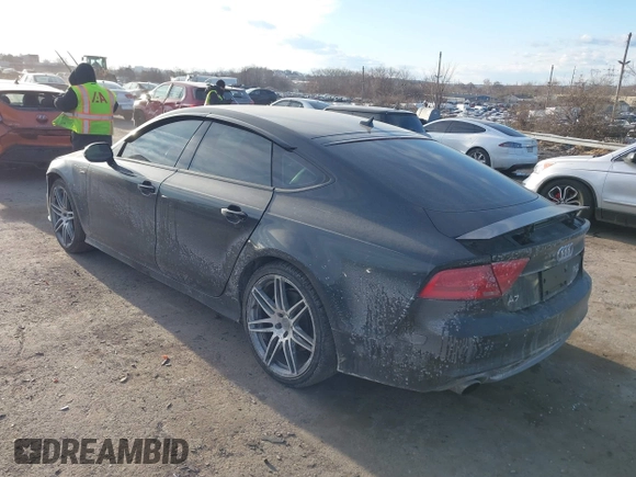 2014 Audi A7 3.0 Prestige with VIN WAU2GAFC6EN030266, listed as a IAAI auction lot 41439486 with 160,917 mi miles. Bid and sale history available at carsss.com. Image 3.