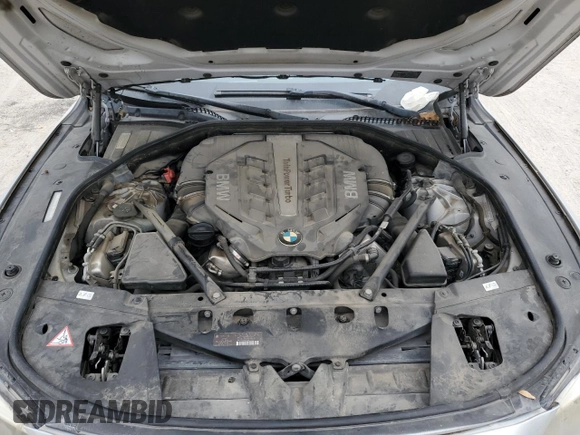 2013 BMW 7 Series 750Li z VIN WBAYE8C56DD133044, wystawiony jako Copart lot #49092615 z przebiegiem 169 699 mil mil oraz Szkoda całkowita • Salvage title. Historia ofert i sprzedaży dostępna na DreamBid. Obrazek 11.