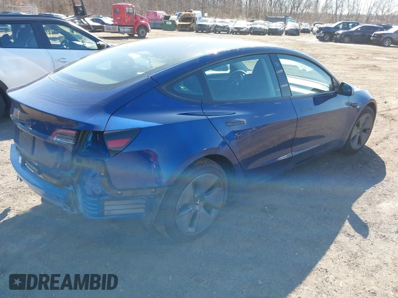 2023 Tesla Model 3 with VIN 5YJ3E1EA2PF690335, listed as a IAAI auction lot 41732701 with 22,238 mi miles and . Bid and sale history available at DreamBid. Image 4.