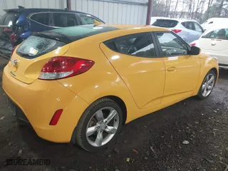 2015 Hyundai Veloster with VIN KMHTC6AD4FU244725, listed as a IAAI auction lot 41547996 with 70,203 mi miles. Bid and sale history available at carsss.com. Image 4.