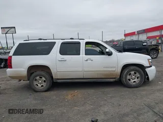 2012 Chevrolet Suburban LT with VIN 1GNSCJE08CR303761, listed as a IAAI auction lot 41738725 with 387,981 mi miles and . Bid and sale history available at DreamBid. Image 14.