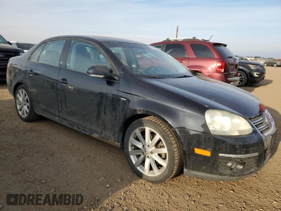 2010 Volkswagen Jetta with VIN 3VWHJ7AJXAM003760, listed as a Copart auction lot 78757794 with 174,071 mi miles and Clean title. Bid and sale history available at DreamBid. Image 4.