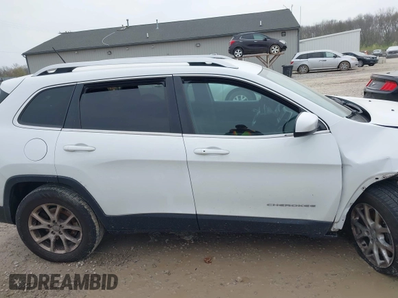 2014 Jeep Cherokee Latitude with VIN 1C4PJMCSXEW150735, listed as a IAAI auction lot 42020944 with 76,303 mi miles and . Bid and sale history available at carsss.com. Image 14.