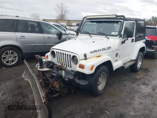 1997 Jeep Wrangler Sahara with VIN 1J4FY49S1VP503639, listed as a IAAI auction lot 41708134 with 102,196 mi miles and . Bid and sale history available at carsss.com. Image 18.