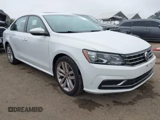 2019 Volkswagen Passat Wolfsburg Edition z VIN 1VWLA7A38KC004758, wystawiony jako IAAI lot #42404110 z przebiegiem 71 694 mil mil oraz . Historia ofert i sprzedaży dostępna na DreamBid. Obrazek 1.