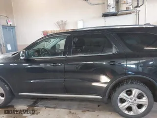 2014 Dodge Durango Limited with VIN 1C4RDJDG1EC973130, listed as a IAAI auction lot 41846596 with 166,182 mi miles. Bid and sale history available at carsss.com. Image 14.