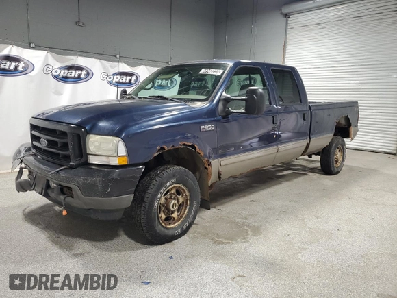 2002 Ford F-350 XL with VIN 1FTSW31F32ED59540, listed as a Copart auction lot 54148235 with 219,395 mi miles and Clean title. Bid and sale history available at DreamBid. Image 1.