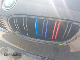 2014 BMW 4 Series 428i xDrive with VIN WBA3N5C52EF716998, listed as a IAAI auction lot 42548467 with 212,418 mi miles and . Bid and sale history available at DreamBid. Image 6.