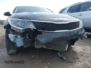 2016 Kia Optima LX with VIN KNAGT4L34G5110742, listed as a IAAI auction lot 41931969 with 128,458 mi miles. Bid and sale history available at carsss.com. Image 6.