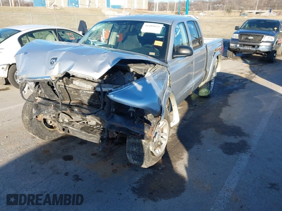 2004 Dodge Dakota Sport with VIN 1D7HG38K34S561735, listed as a IAAI auction lot 41409622 with Not Provided miles. Bid and sale history available at carsss.com. Image 2.