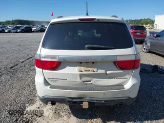 2013 Dodge Durango Citadel with VIN 1C4SDHET0DC571961, listed as a IAAI auction lot 42050261 with 257,637 mi miles and . Bid and sale history available at DreamBid. Image 6.