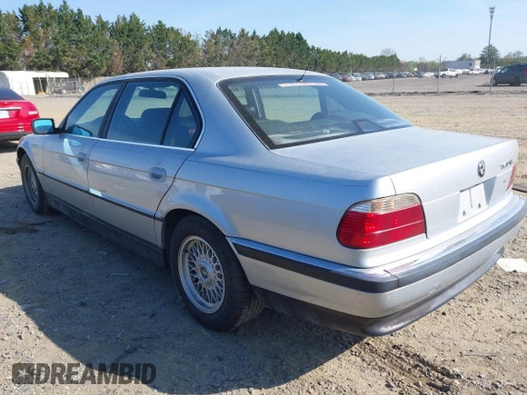 1998 BMW 7 Series 740il with VIN WBAGJ8324WDM11469, listed as a IAAI auction lot 42069641 with 1 mi miles. Bid and sale history available at carsss.com. Image 3.