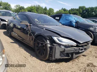 2016 Tesla Model S 90D with VIN 5YJSA1E42GF139758, listed as a Copart auction lot 63077255 with 78,235 mi miles and Salvage title. Bid and sale history available at DreamBid. Image 4.
