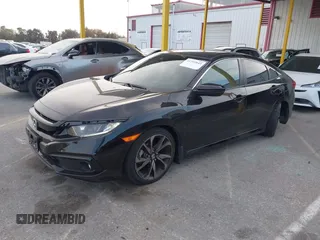 2021 Honda Civic Sport with VIN 2HGFC2F81MH515005, listed as a IAAI auction lot 41725843 with 43,583 mi miles and . Bid and sale history available at DreamBid. Image 2.