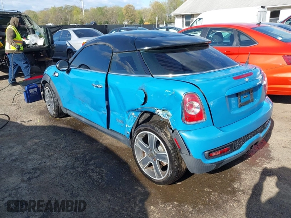 2013 MINI Coupe S with VIN WMWSX3C55DT466604, listed as a IAAI auction lot 42033723 with 109,814 mi miles and . Bid and sale history available at DreamBid. Image 3.
