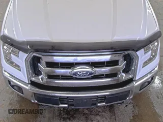 2016 Ford F-150 XLT with VIN 1FTFW1EF1GKF00212, listed as a IAAI auction lot 42659796 with 201,827 mi miles and . Bid and sale history available at DreamBid. Image 2.