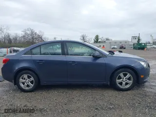 2014 Chevrolet Cruze 1LT with VIN 1G1PC5SB0E7213216, listed as a IAAI auction lot 41955710 with 147,003 mi miles. Bid and sale history available at carsss.com. Image 13.