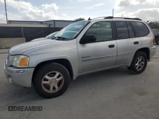 2006 GMC Envoy SLT with VIN 1GKDS13S662139632, listed as a Copart auction lot 47387245 with 246,803 mi miles and Salvage Title. Bid and sale history available at carsss.com. Image 1.