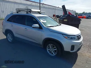 2015 Kia Sorento LX with VIN 5XYKTDA75FG584238, listed as a IAAI auction lot 39644502 with 123,734 mi miles and . Bid and sale history available at DreamBid. Image 1.