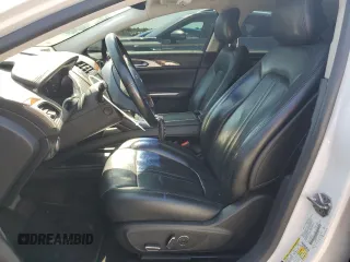 2015 Lincoln MKZ z VIN 3LN6L2JK8FR616661, wystawiony jako Copart lot #61588325 z przebiegiem 65 382 mil mil oraz Szkoda całkowita • Salvage title. Historia ofert i sprzedaży dostępna na DreamBid. Obrazek 7.