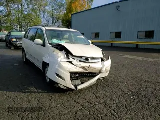2010 Toyota Sienna XLE z VIN 5TDDK4CC3AS034036, wystawiony jako Copart lot #78494514 z przebiegiem 208 928 mil mil oraz Szkoda całkowita • Salvage title. Historia ofert i sprzedaży dostępna na DreamBid. Obrazek 11.