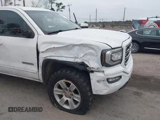 2019 GMC Sierra 1500 Limited with VIN 2GTR1LECXK1223212, listed as a IAAI auction lot 41166361 with 114,197 mi miles. Bid and sale history available at carsss.com. Image 6.