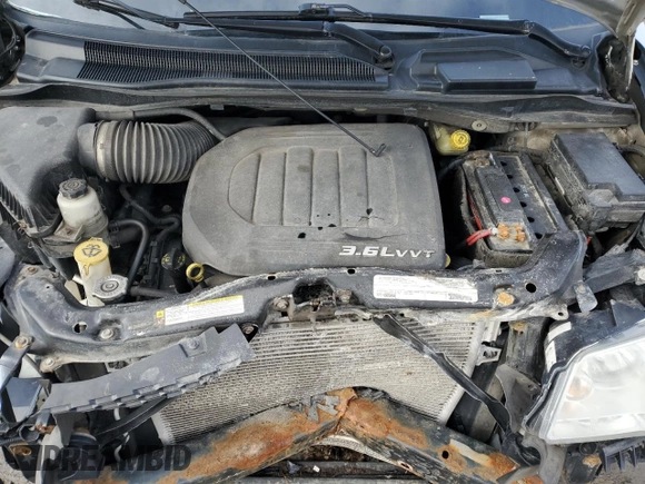 2012 Dodge Grand Caravan SE with VIN 2C4RDGBG8CR137177, listed as a Copart auction lot 49288765 with 389,959 mi miles and Salvage Title. Bid and sale history available at DreamBid. Image 12.