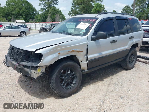 2002 Jeep Grand Cherokee Laredo with VIN 1J4GX48S32C288387, listed as a IAAI auction lot 42212249 with 151,028 mi miles and . Bid and sale history available at DreamBid. Image 2.
