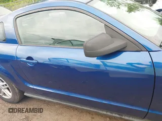 2009 Ford Mustang with VIN 1ZVHT80N795142637, listed as a IAAI auction lot 42595602 with 69,284 mi miles and . Bid and sale history available at DreamBid. Image 14.