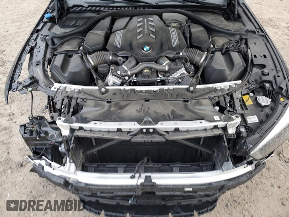 2022 BMW 8 Series M850i z VIN WBAGV8C02NCH18326, wystawiony jako Copart lot #78362624 z przebiegiem 21 393 mil mil oraz Szkody całkowita. Historia ofert i sprzedaży dostępna na DreamBid. Obrazek 11.