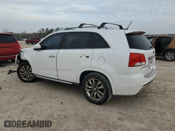 2012 Kia Sorento SX with VIN 5XYKW4A21CG303835, listed as a Copart auction lot 48239835 with 335,934 mi miles and Salvage Title. Bid and sale history available at carsss.com. Image 2.