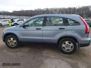 2007 Honda CR-V LX with VIN JHLRE48397C098021, listed as a IAAI auction lot 41864761 with 213,482 mi miles. Bid and sale history available at carsss.com. Image 14.