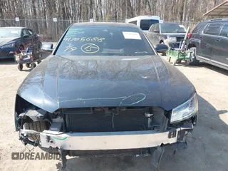 2017 Audi A8 with VIN WAU44AFDXHN004395, listed as a IAAI auction lot 41705688 with 63,282 mi miles and . Bid and sale history available at DreamBid. Image 12.
