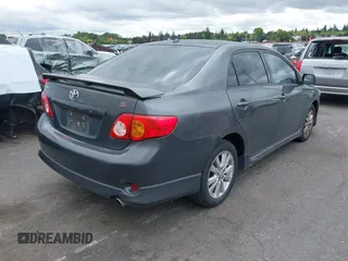 2009 Toyota Corolla with VIN 1NXBU40E39Z065572, listed as a IAAI auction lot 42138980 with 195,822 mi miles. Bid and sale history available at carsss.com. Image 4.