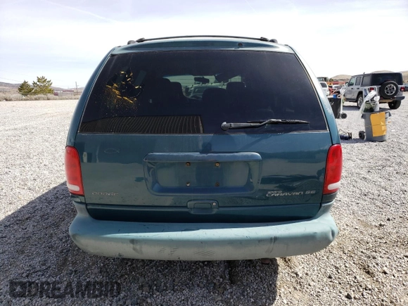 2000 Dodge Caravan SE z VIN 1B4GP44G1YB735849, wystawiony jako Copart lot #49924075 z przebiegiem 184 031 mil mil oraz Szkoda całkowita • Salvage title. Historia ofert i sprzedaży dostępna na DreamBid. Obrazek 6.