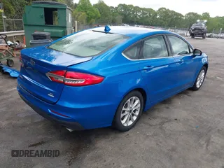 2020 Ford Fusion SE with VIN 3FA6P0HD8LR235608, listed as a IAAI auction lot 42099168 with 66,656 mi miles and . Bid and sale history available at DreamBid. Image 4.