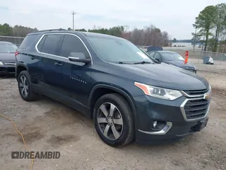 2021 Chevrolet Traverse LT z VIN 1GNEVHKW6MJ214098, wystawiony jako IAAI lot #41794899 z przebiegiem 102 784 mil mil oraz . Historia ofert i sprzedaży dostępna na DreamBid. Obrazek 1.