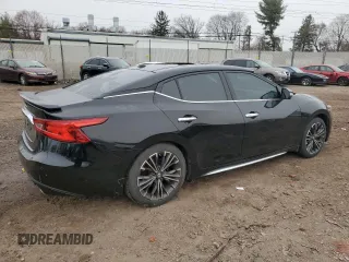 2016 Nissan Maxima SL with VIN 1N4AA6AP3GC436677, listed as a Copart auction lot 49880185 with 128,748 mi miles and Salvage Title. Bid and sale history available at DreamBid. Image 3.