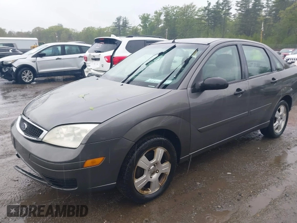2007 Ford Focus S z VIN 1FAFP34N77W336075, wystawiony jako IAAI lot #42325783 z przebiegiem 153 194 mil mil oraz . Historia ofert i sprzedaży dostępna na DreamBid. Obrazek 2.