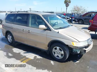 2001 Honda Odyssey EX z VIN 2HKRL18611H553161, wystawiony jako IAAI lot #42339181 z przebiegiem 89 235 mil mil oraz . Historia ofert i sprzedaży dostępna na DreamBid. Obrazek 1.