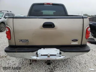 2001 Ford F-150 SuperCrew XLT with VIN 1FTRW07L21KF72022, listed as a Copart auction lot 69532204 with 205,793 mi miles and Salvage Title. Bid and sale history available at carsss.com. Image 6.